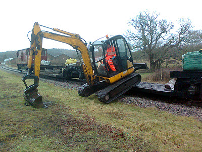Unloading the digger at Whitecroft
