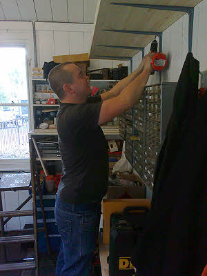Ian working on the new shelving