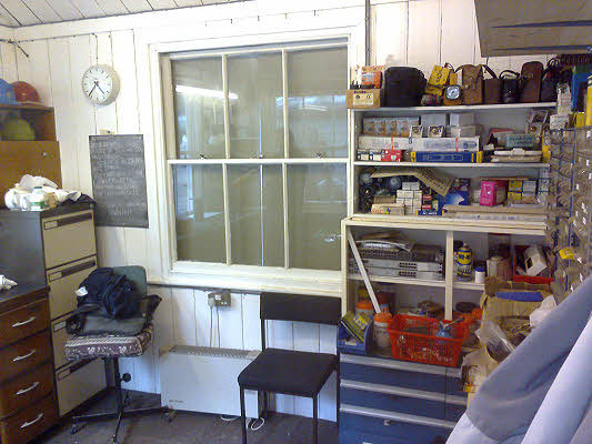 The office with the partition and false ceiling removed.